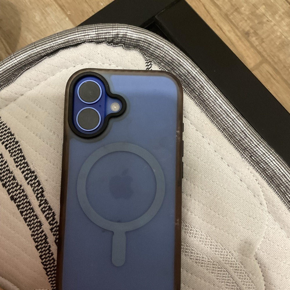 Apple iPhone with Blue MagSafe Case iPhone 16. Locked